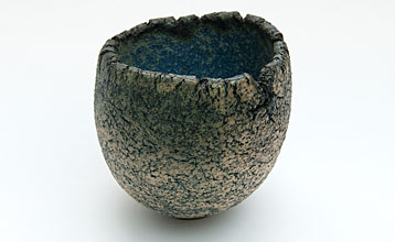 Small bowl with cobalt oxide exterior