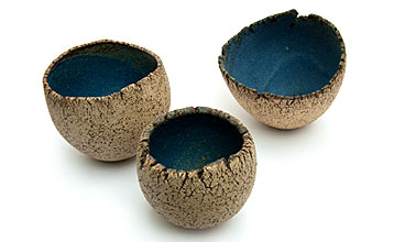 Group of 3 bowls with a blue/green interior